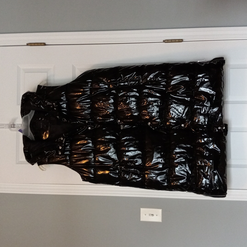 Shiny new long vest